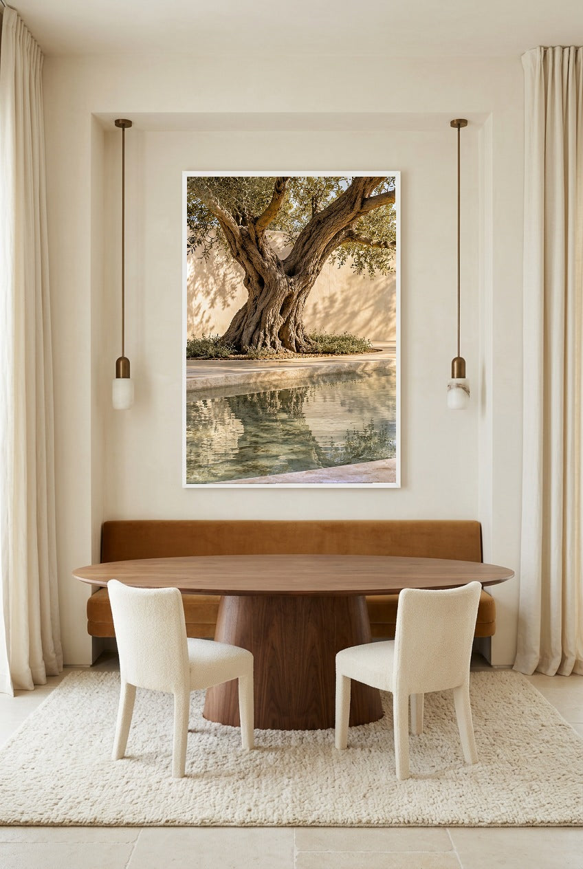 The Pool Olive Tree — poster in a white frame above a dining table