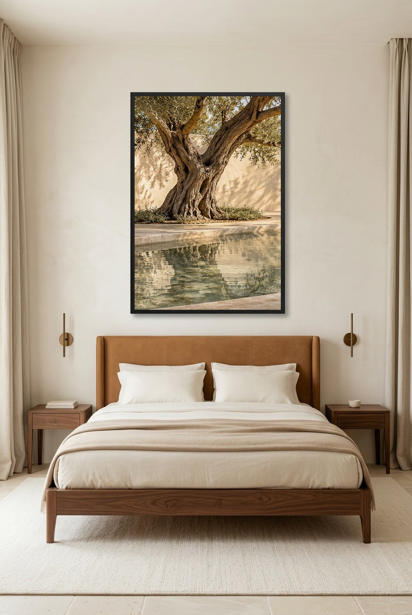 The Pool Olive Tree — poster in a black frame above a bed