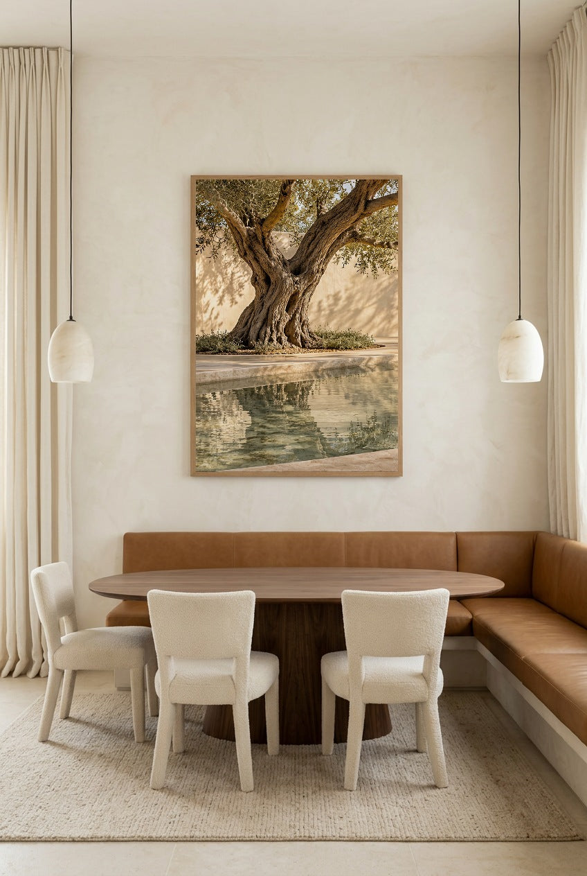 The Pool Olive Tree — poster in an oak frame above a dining table