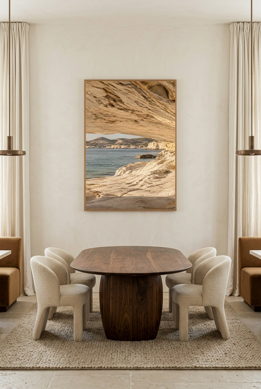 The Way Out to Sea — poster in an oak frame above a dining table