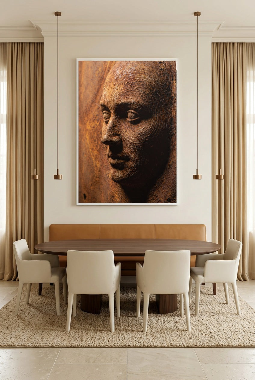 Rust Face — poster in a white frame above a dining table