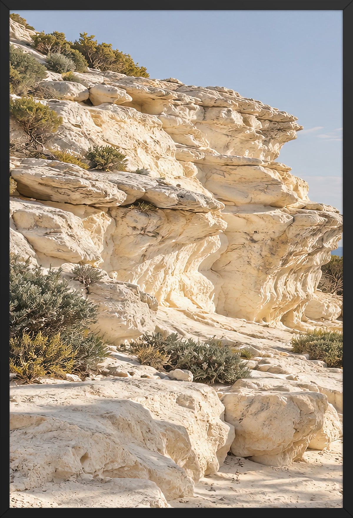 The Sculpted Cliff — poster in a black frame, 61 × 91 cm