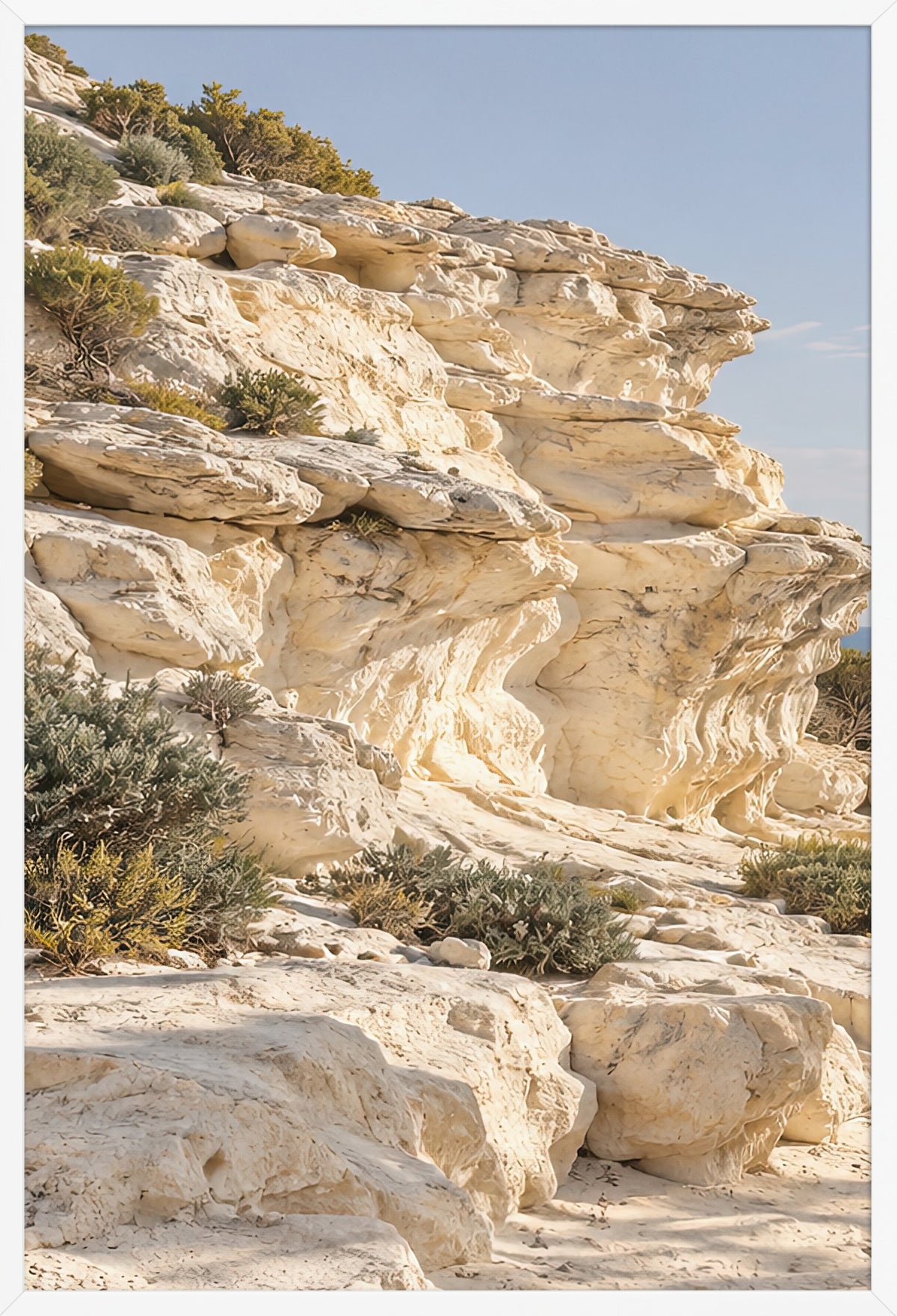 The Sculpted Cliff — poster in a white frame, 61 × 91 cm