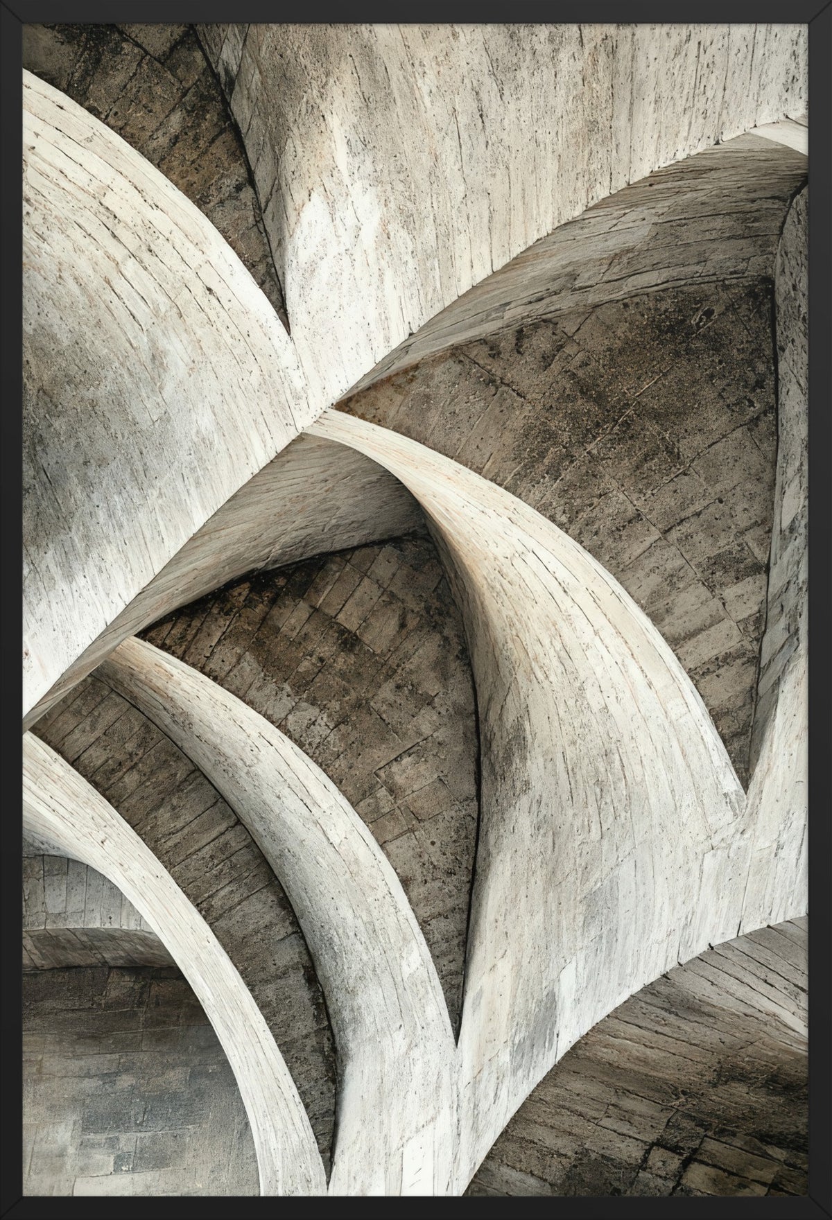 The Concrete Spiral — poster in a black frame, front view