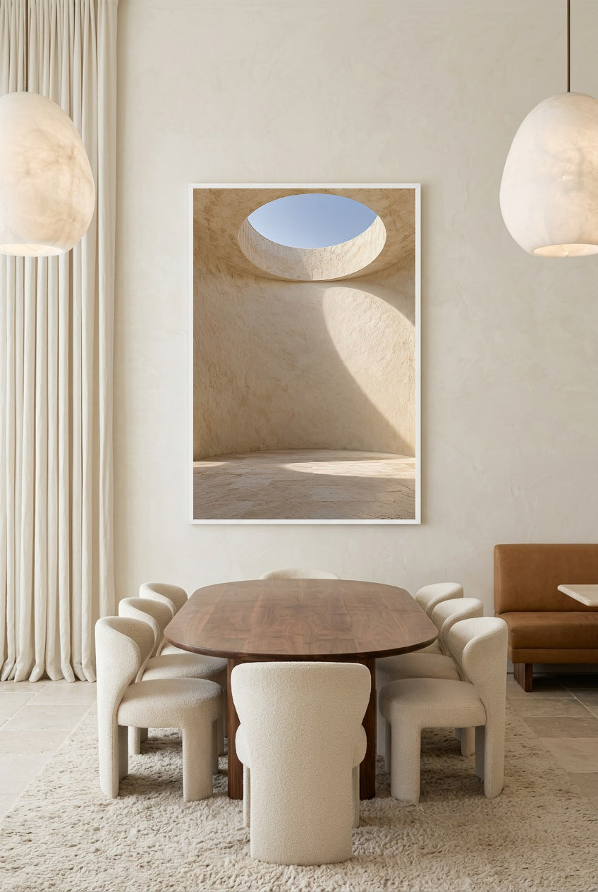 The Oculus — poster in a white frame above a dining table