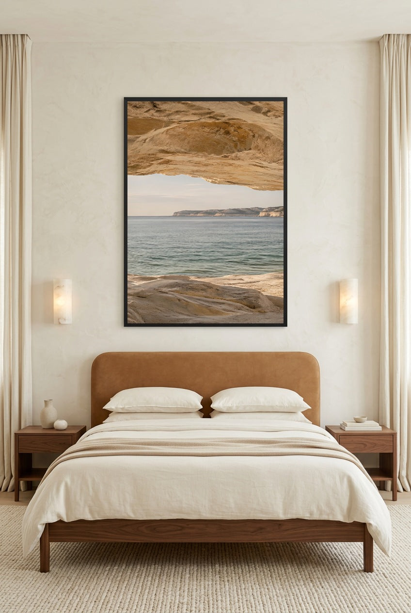 The Horizon beneath the Rock — poster in a black frame above a bed