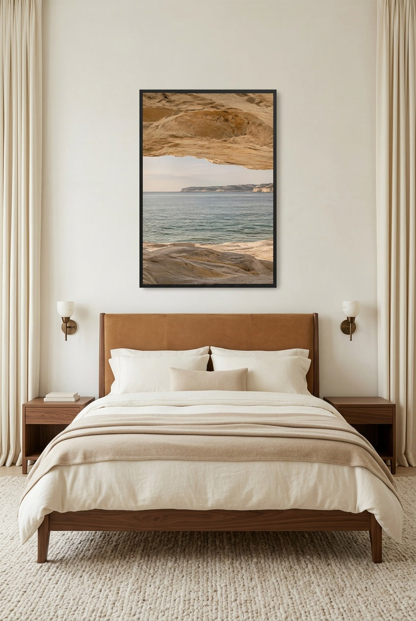 The Horizon beneath the Rock — poster in a black frame in a bright bedroom