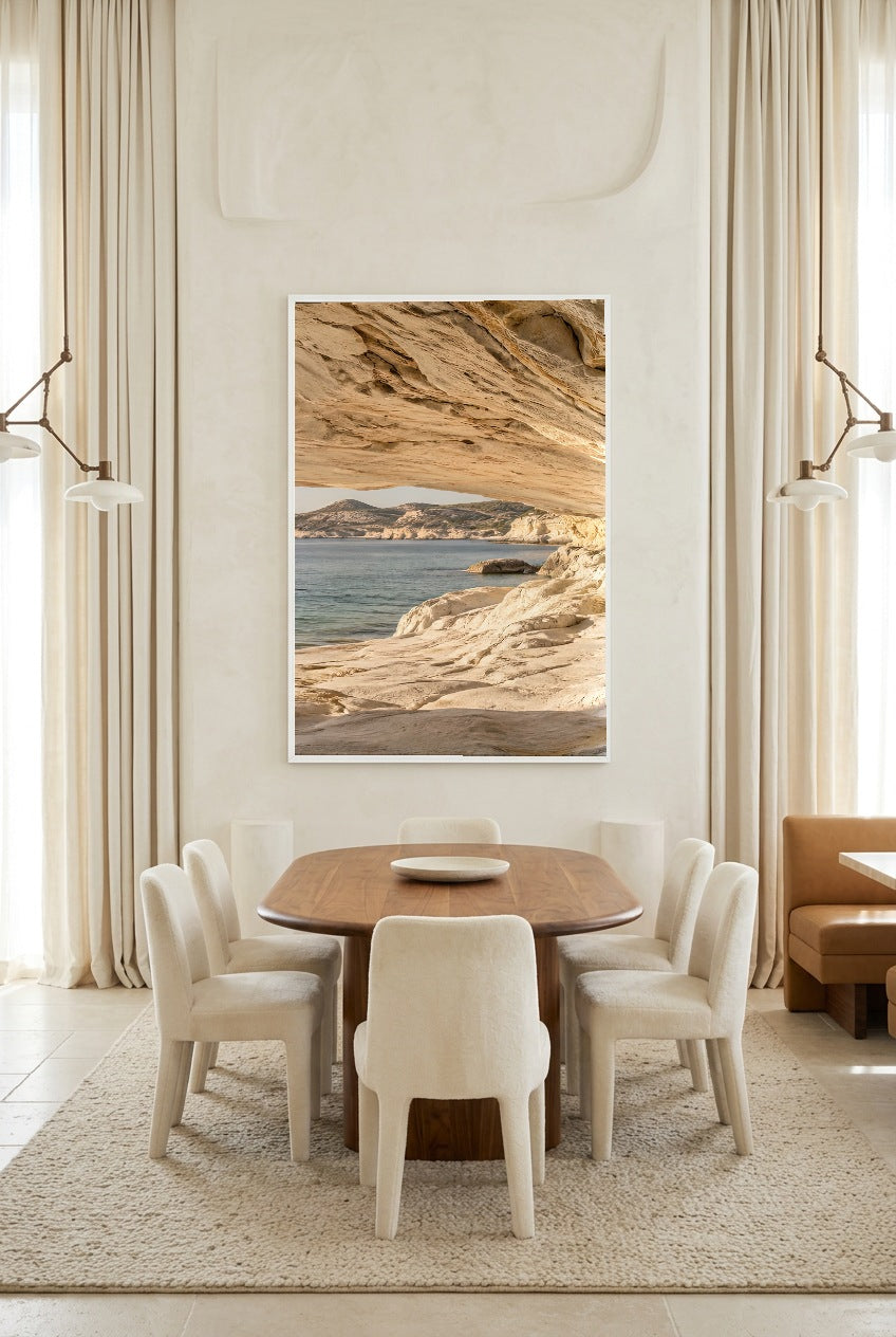 The Way Out to Sea — poster in a white frame above a dining table