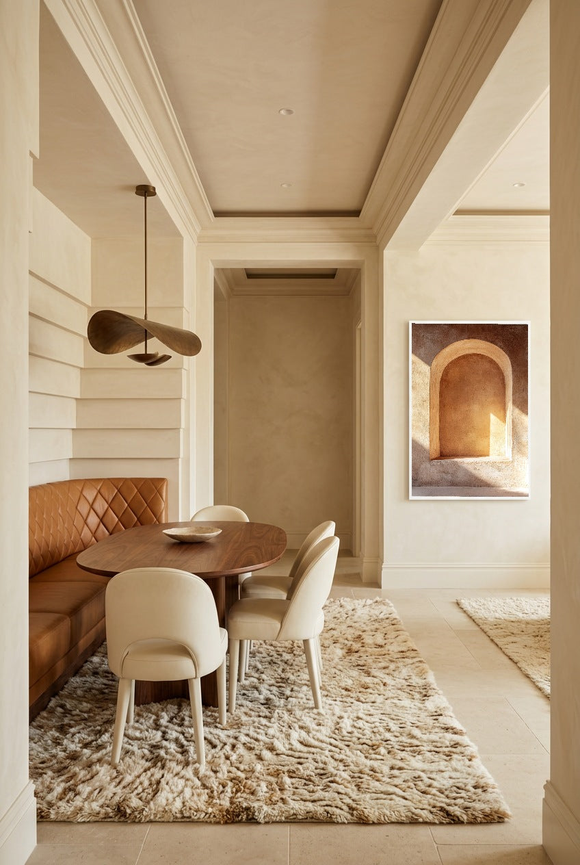Golden Niche — poster in a white frame above a dining table