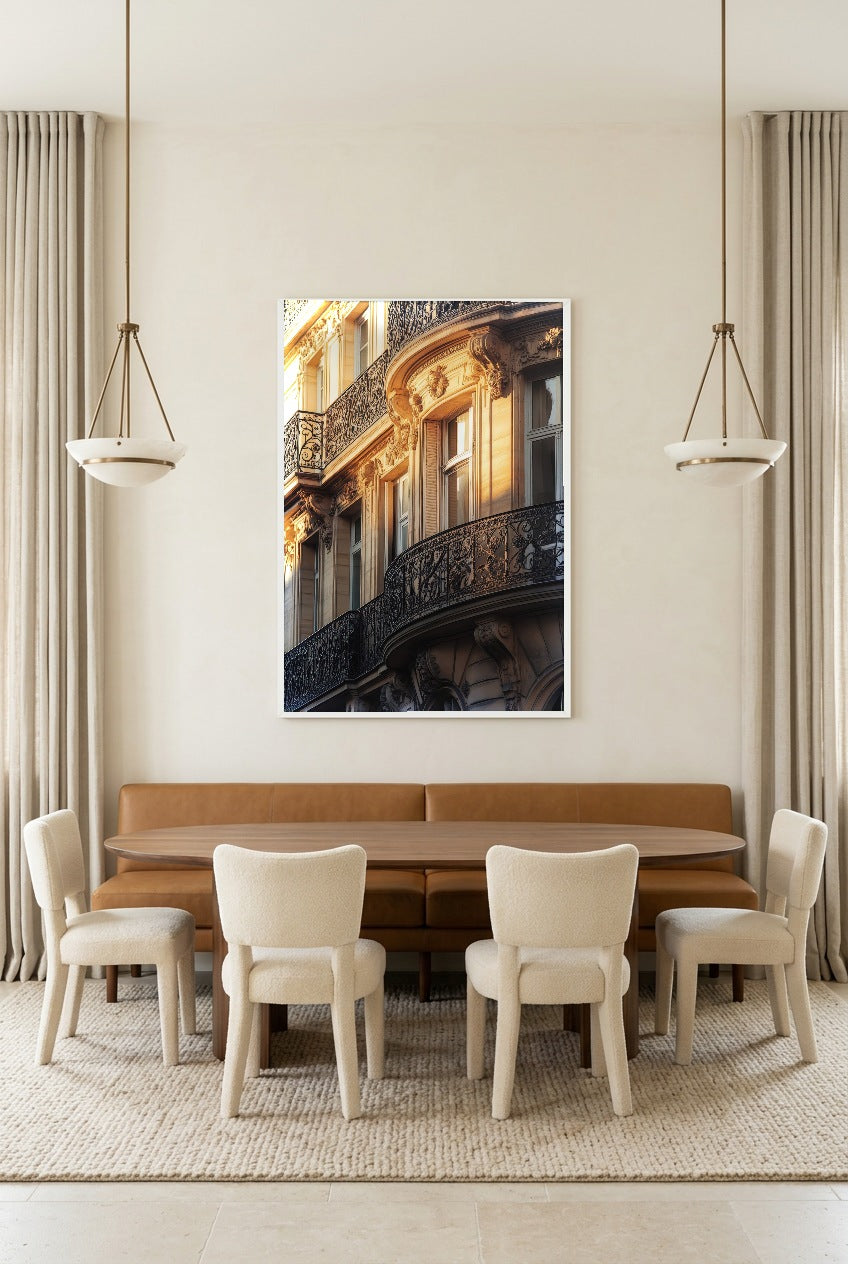 L’Haussmann — poster in a white frame in a dining room