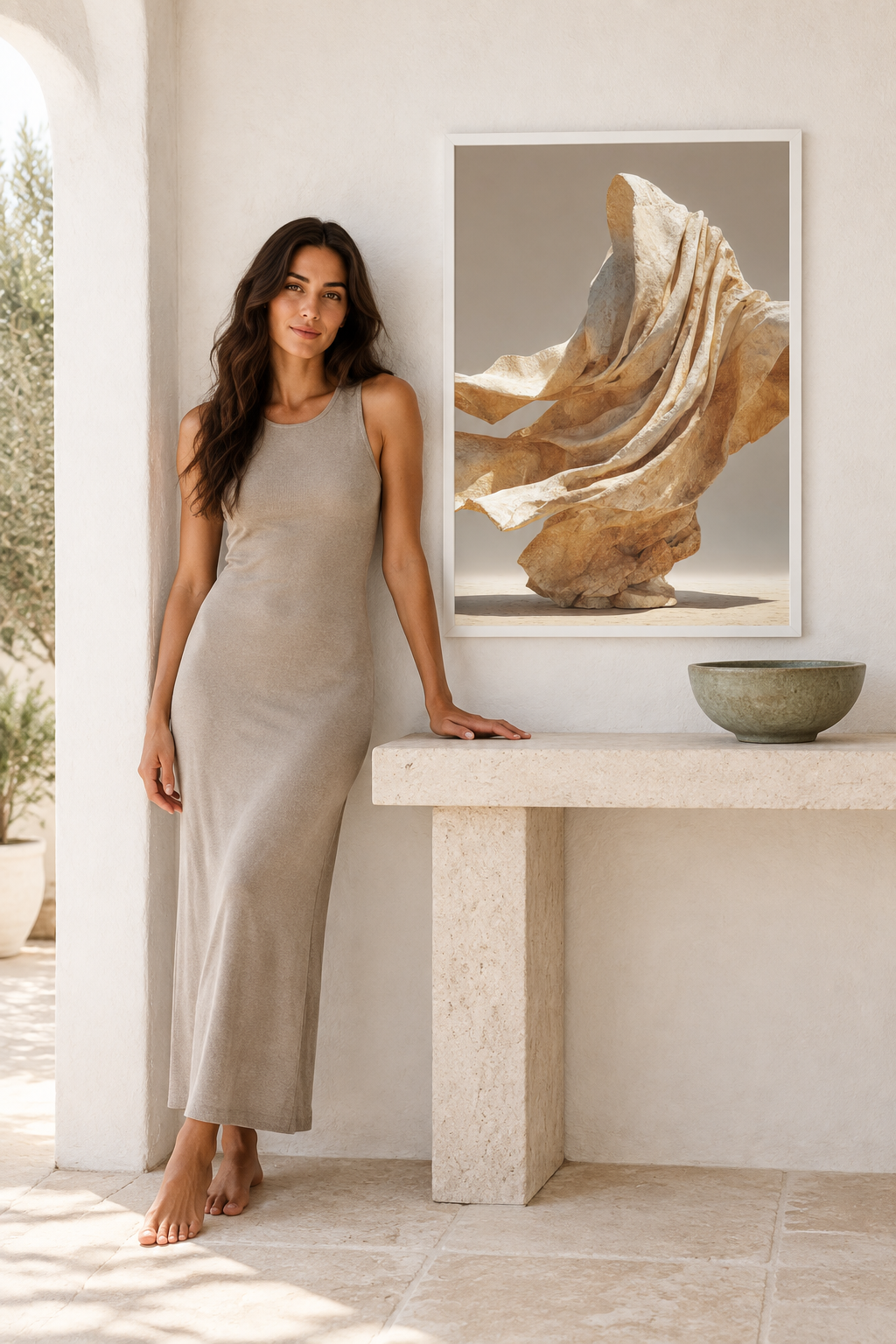 The Drape in the Wind — Égérie Cassili in a greige dress beside it