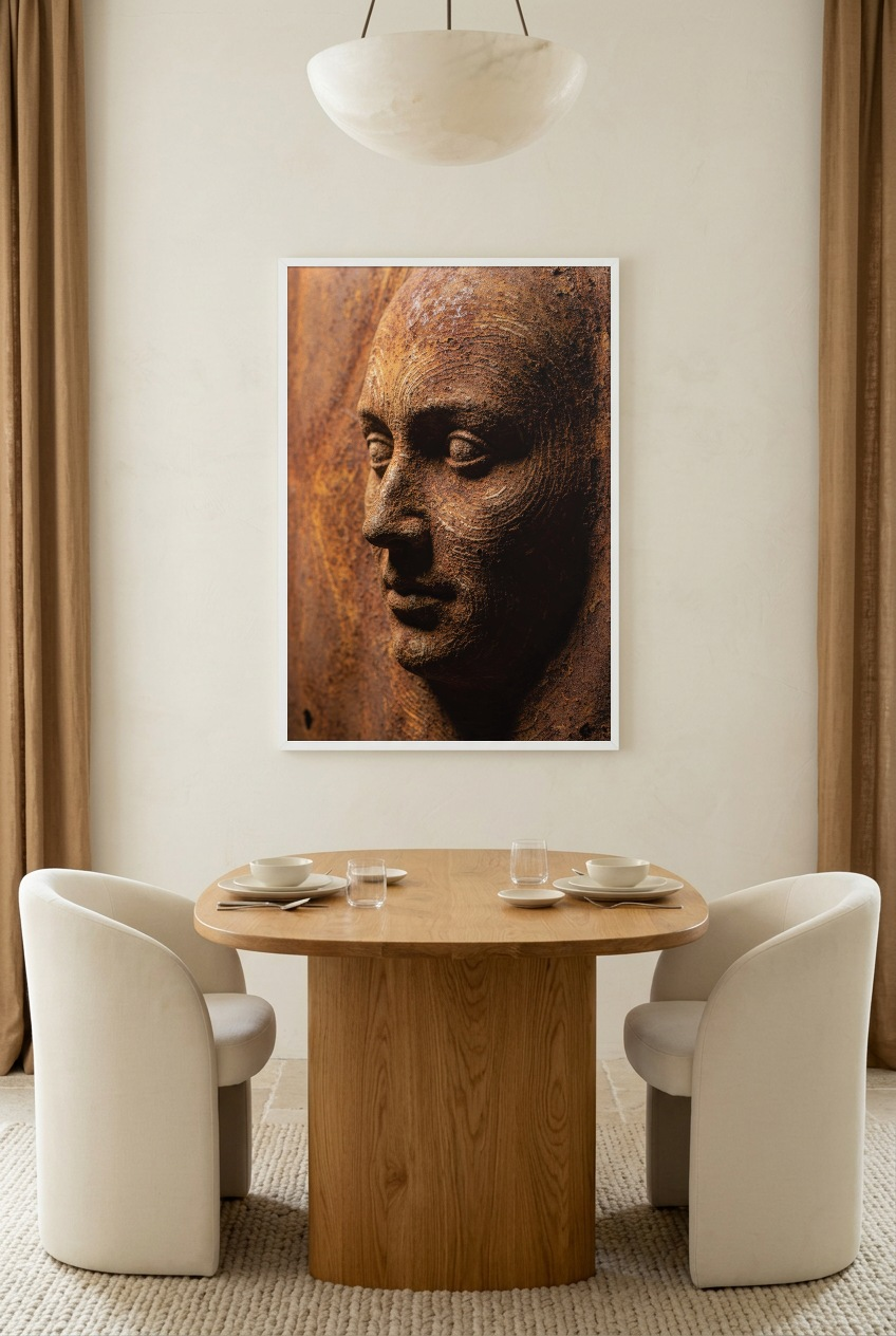 Visage de Rouille — poster in a white frame in a dining room